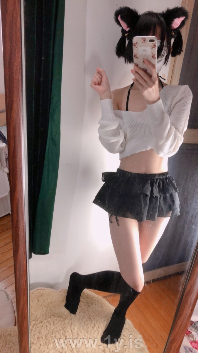 Cute slim cat girl wearing white sweater (8)