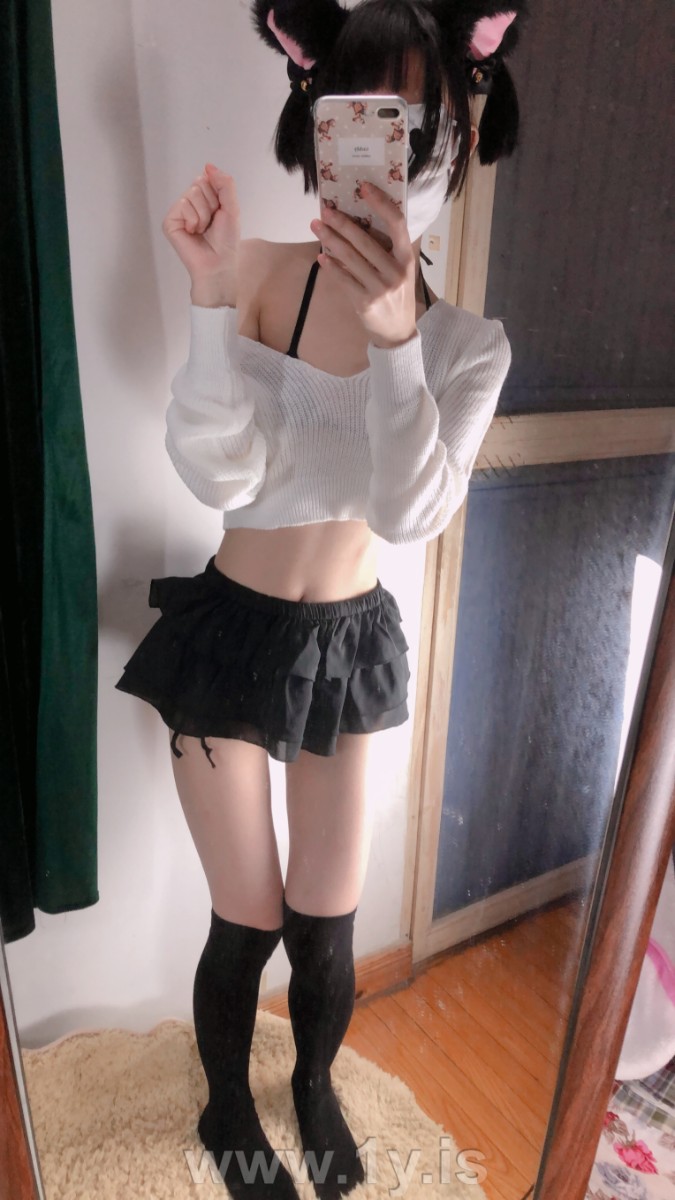 Cute slim cat girl wearing white sweater (10)