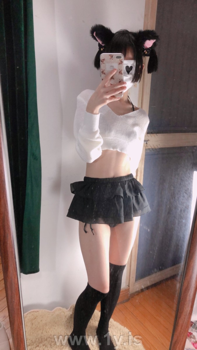 Cute slim cat girl wearing white sweater (11)