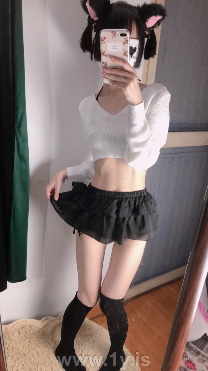 Cute slim cat girl wearing white sweater (23)