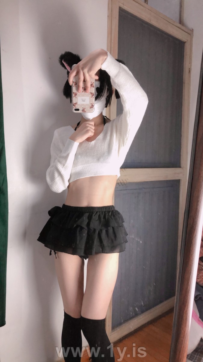 Cute slim cat girl wearing white sweater (27)