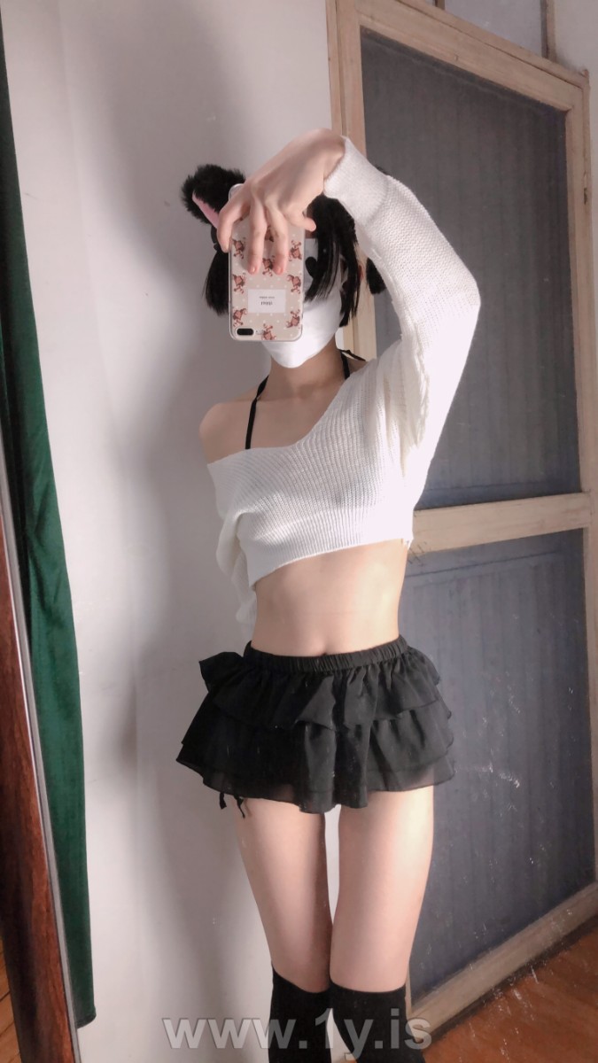 Cute slim cat girl wearing white sweater (28)
