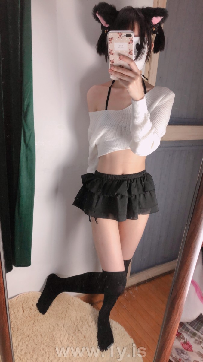 Cute slim cat girl wearing white sweater (30)