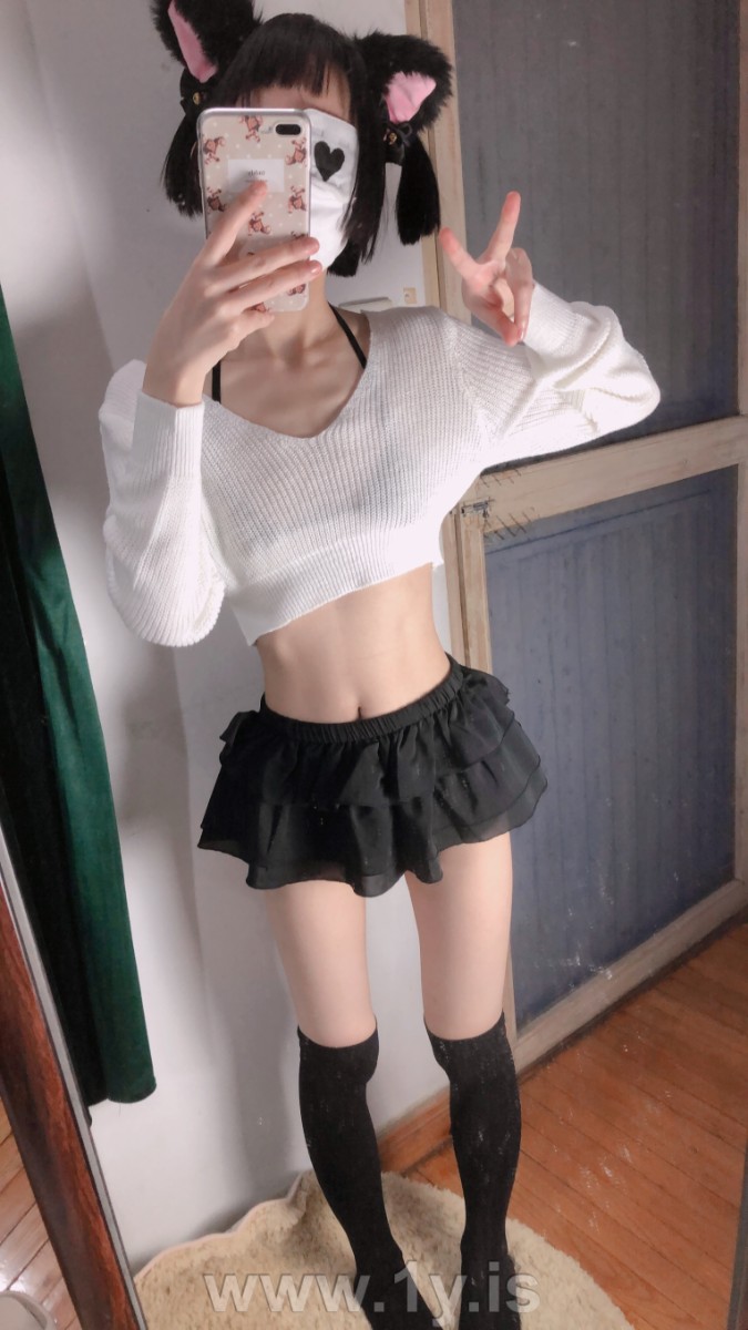 Cute slim cat girl wearing white sweater (33)