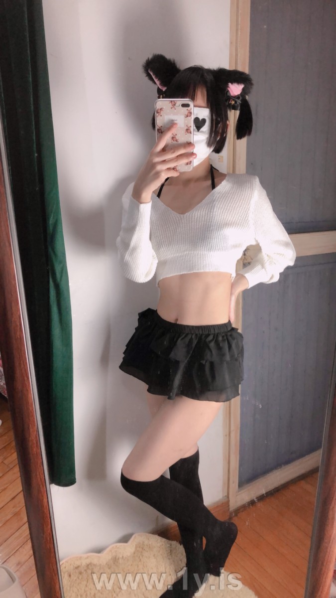 Cute slim cat girl wearing white sweater (35)