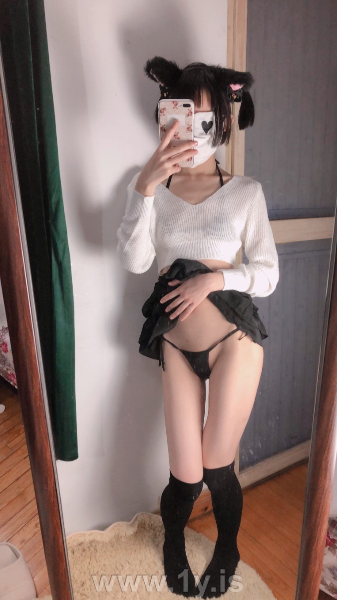 Cute slim cat girl wearing white sweater (37)