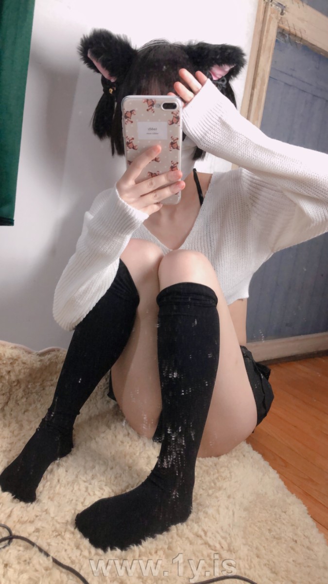 Cute slim cat girl wearing white sweater (48)