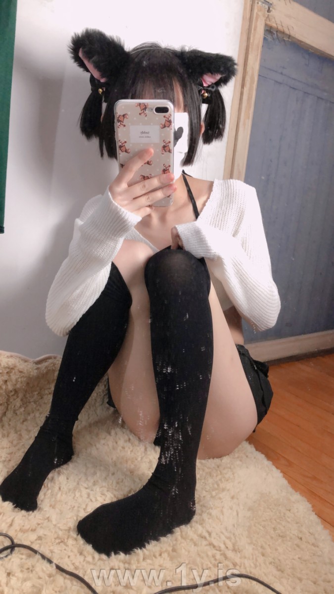 Cute slim cat girl wearing white sweater (49)