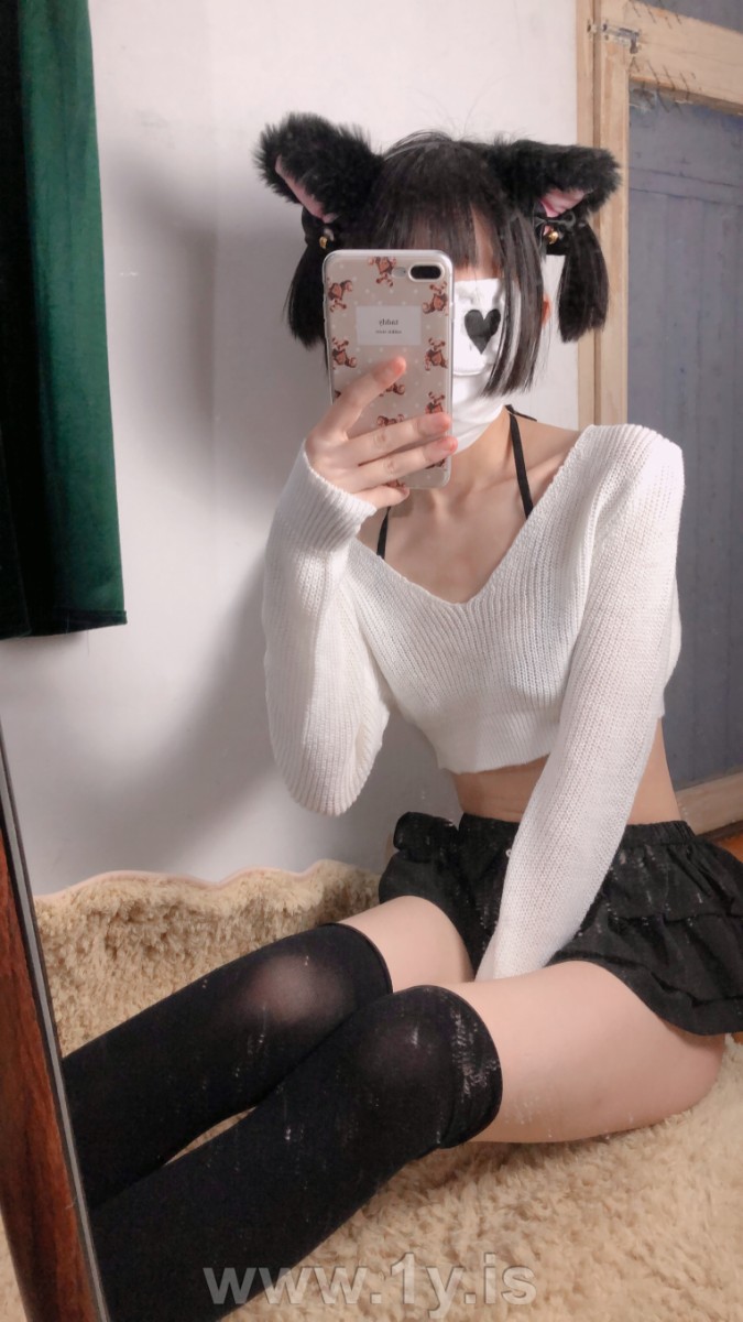 Cute slim cat girl wearing white sweater (51)