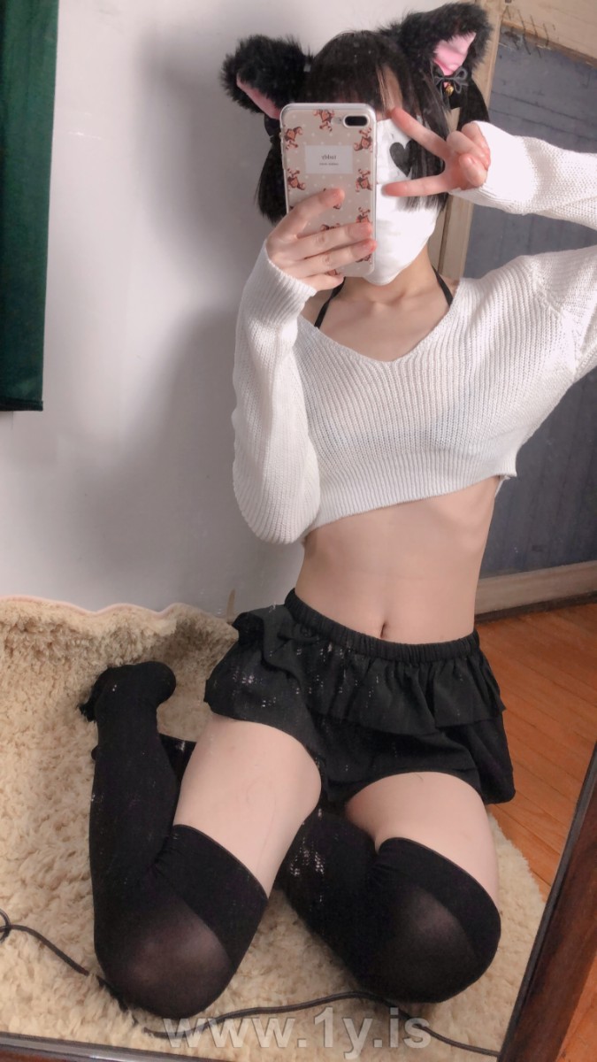 Cute slim cat girl wearing white sweater (54)