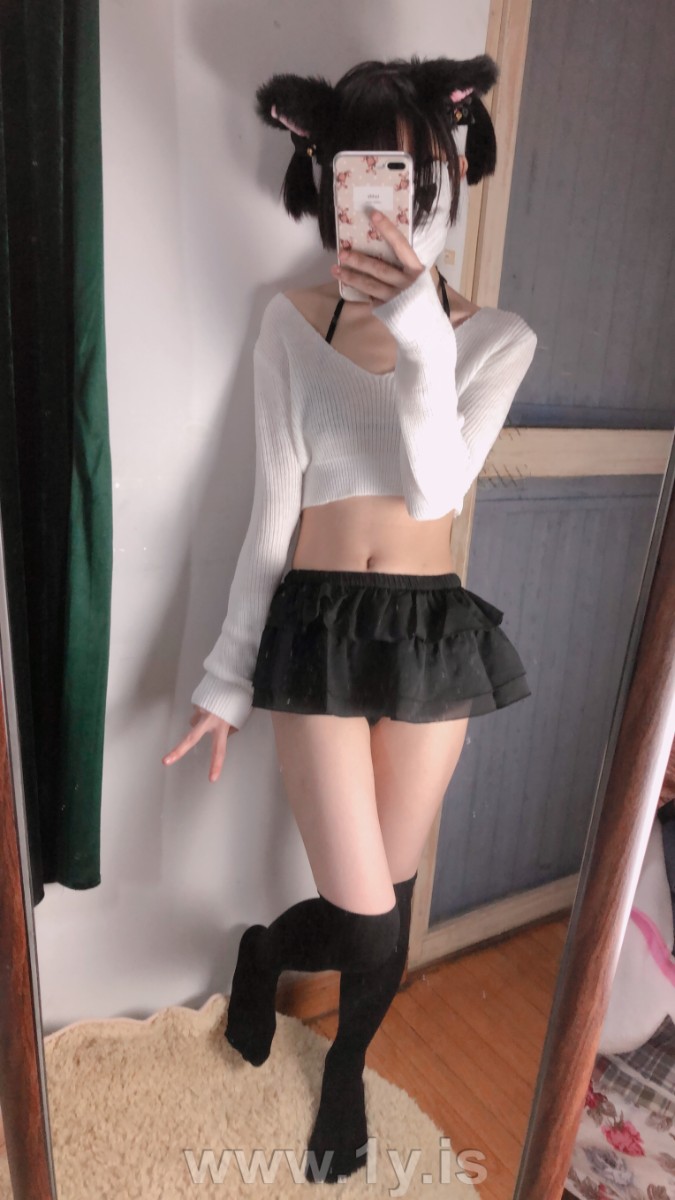 Cute slim cat girl wearing white sweater (69)