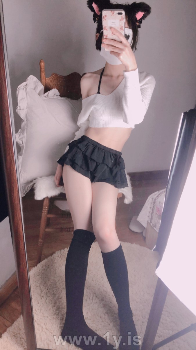 Cute slim cat girl wearing white sweater (136)